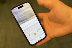 Hand holding phone showing map