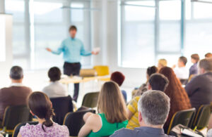 Employment Laws to Know as Your Business Grows - Photo in Meeting